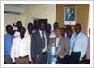 The SCOUL football team with CEO Mr. Bapat, showcasing the district level trophy they won